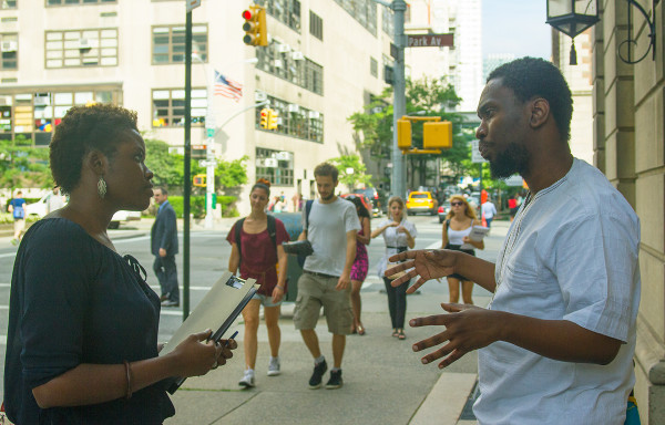 Kambale Musavuli is a Congolese activist of the Friends of the Congo, when he first arrived in the US he went to work in a fast-food because Eddie Murphy did in one of his films